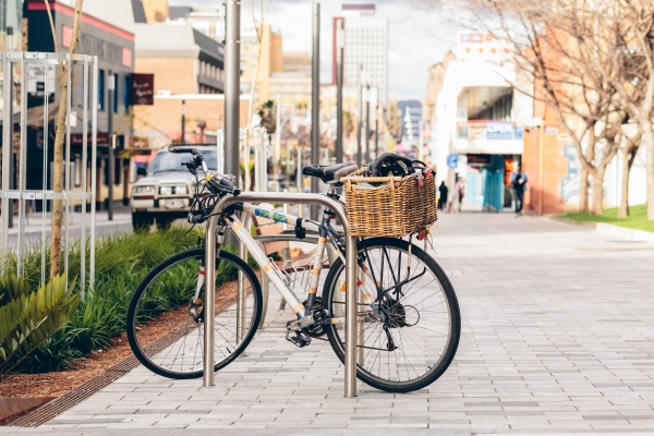 Dedicated bike parking next to pedestrian crossings and movement networks is an important element of design in City Streets