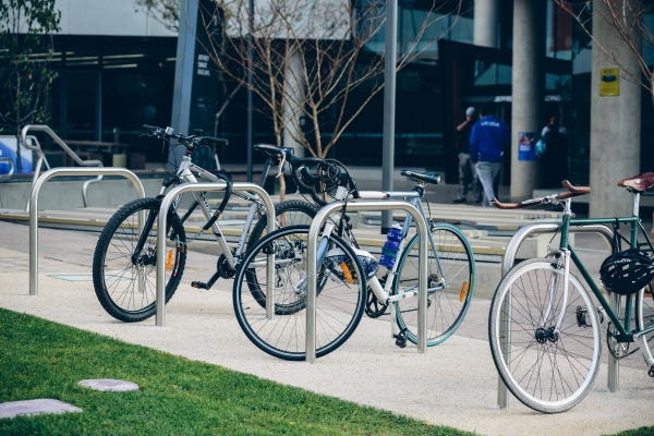 Consistently arranged street furniture such as bike racks help to delineate zones of movement